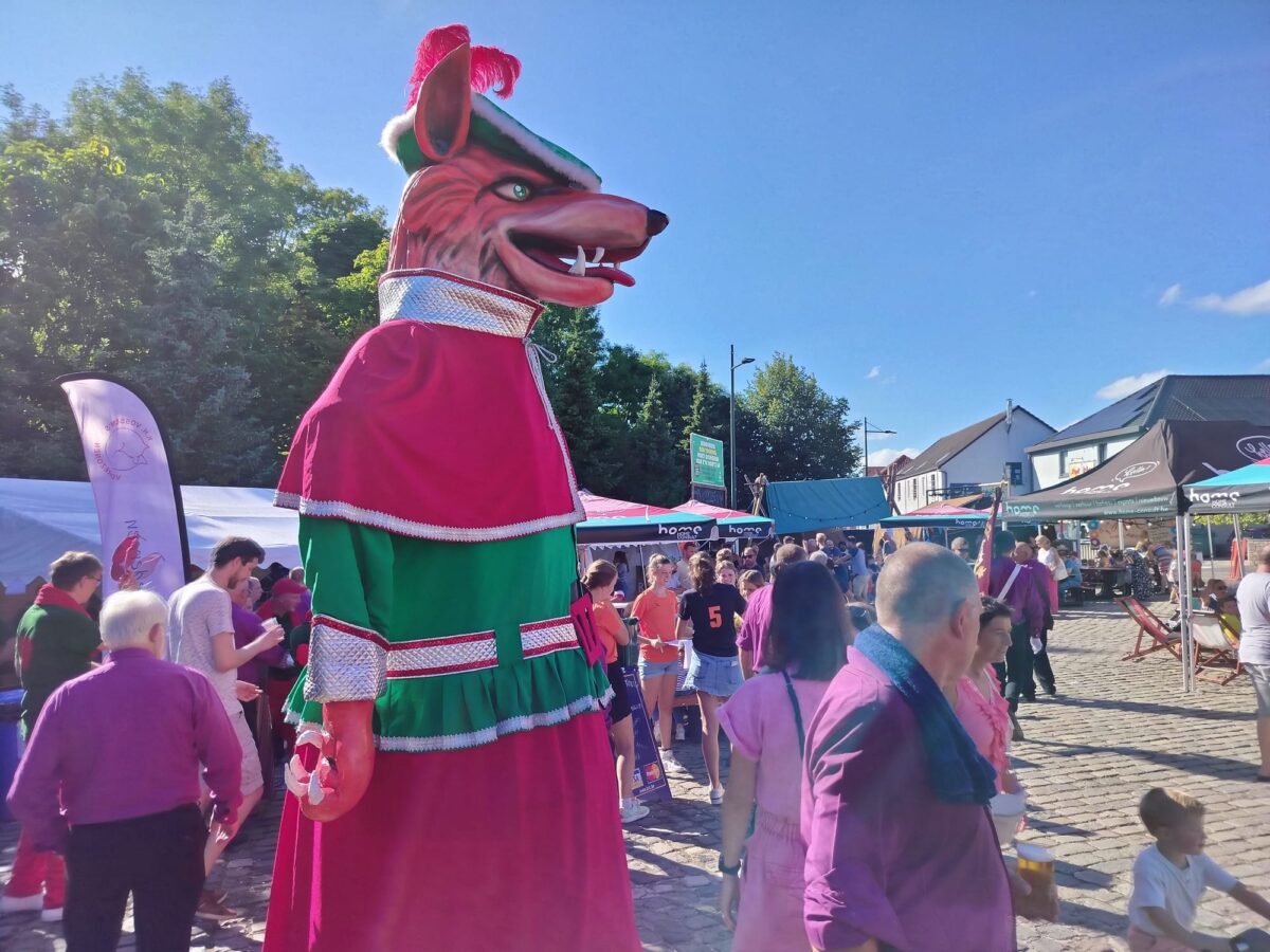 De Vos van Vossem giant in red and green at Vossem Festival, Belgium